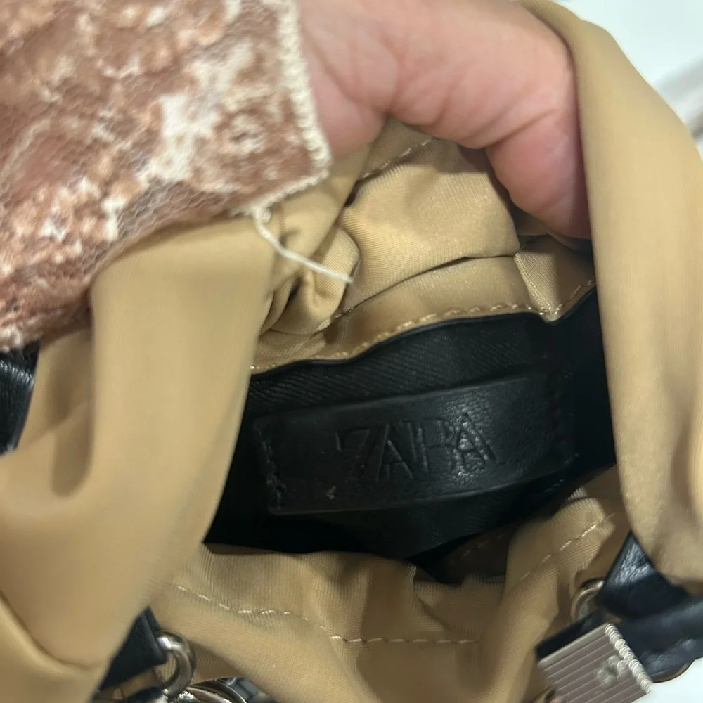Zara tan quilted crossbody bag with black strap